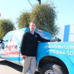 General Manager Steven Kane next to the Handy Metal Mart truck.